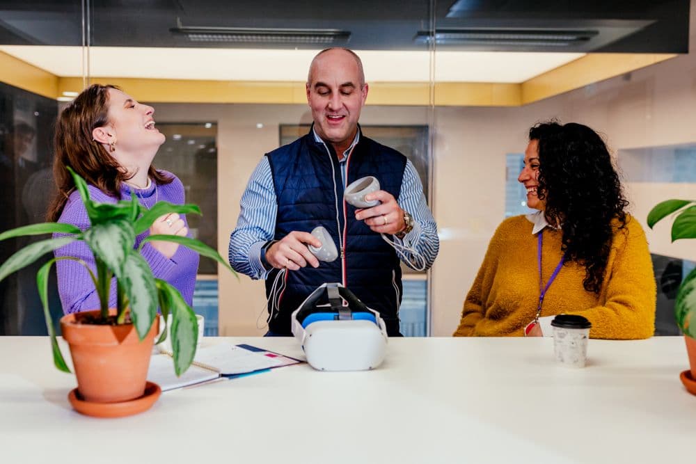 B.D. Dalton sharing a laugh with colleagues